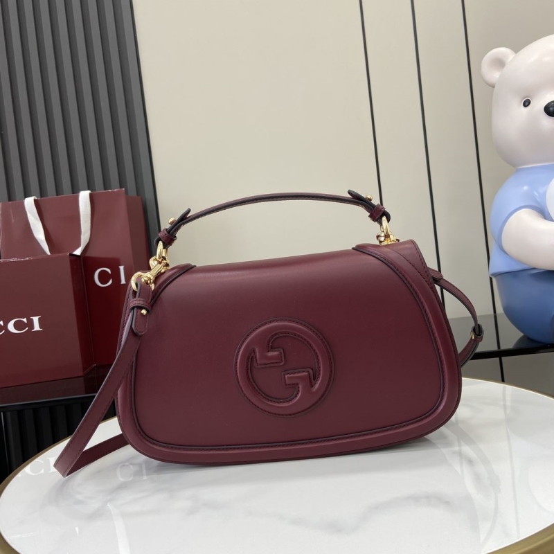 G*u*i top handle bags